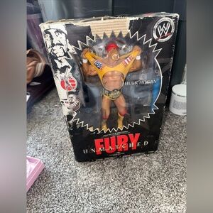 WWE Hulk Hogan Action Figure with Red and Yellow Attire- rare collectible